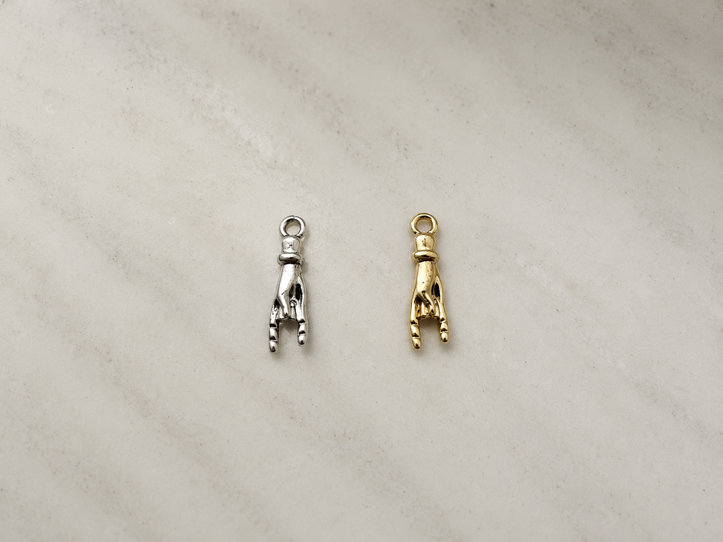 Mano Cornuto Charm